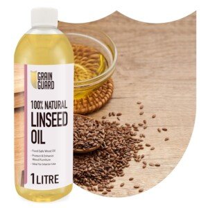 Packaging of GRAIN GUARD Raw Linseed Oil for Wood 1L, showcasing its suitability for interior wood preservation.